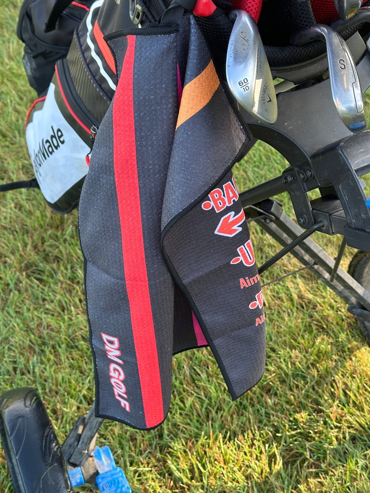 The Caddy Towel - Part towel. Part cheat sheet. Fully essential.Premium waffle microfiber – Not your average rag. - DM Golf
